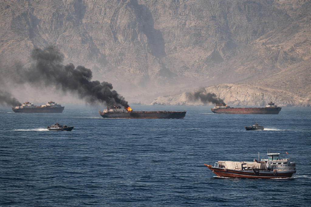 Strait of Hormuz closed again, Iran says, as ships attacked