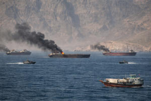 Strait of Hormuz closed again, Iran says, as ships attacked